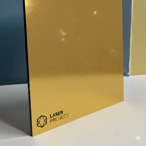 Plástico bicapa dorado cepillado y grabado negro