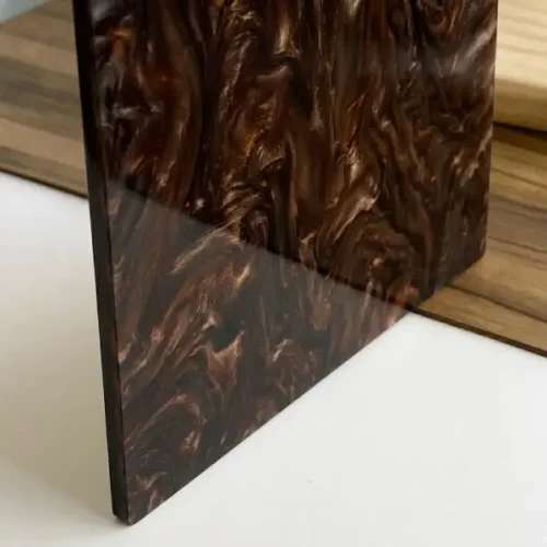 Metacrilato de color marrón con efecto nacarado
